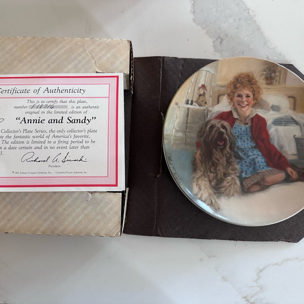 The Edwin M. Knowles "Annie and Sandy" collector plate.